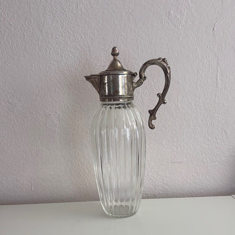 Vintage Ribbed Glass Pitcher with Ornate Silver-Tone Lid and Handle